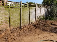 The old wall and trees is cleared away.